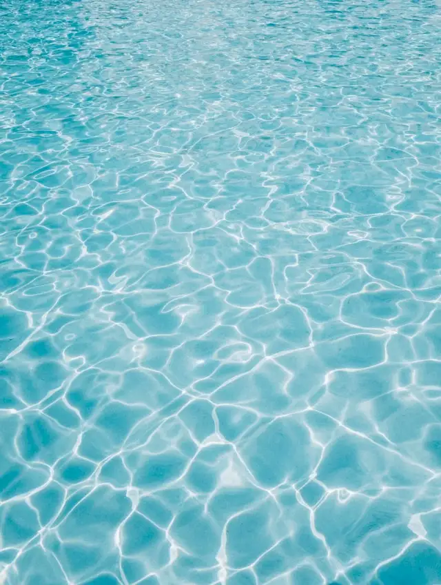 Clear water with soft light, representing hydration and vitality